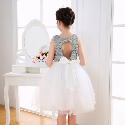 Modern gyerekruha fehér szalaggal