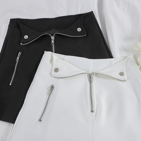 Pantaloni scurți eleganti de damă, cu fermoar, în alb-negru