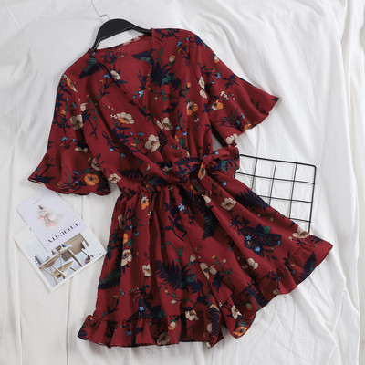 Stílusos női overall virágos motívummal és V-nyakkal