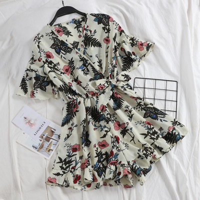 Stílusos női overall virágos motívummal és V-nyakkal