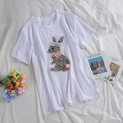 Stílusos női póló fehér és fekete színben, 3D elemmel