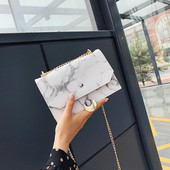 Geanta de dama eleganta din piele ecologica cu elemente metalice