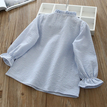Модерна детска риза в бял и син цвят с бродерия