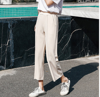 Modern női nadrág fehér és fekete színben