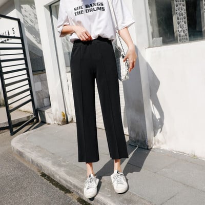 Modern női nadrág fehér és fekete színben