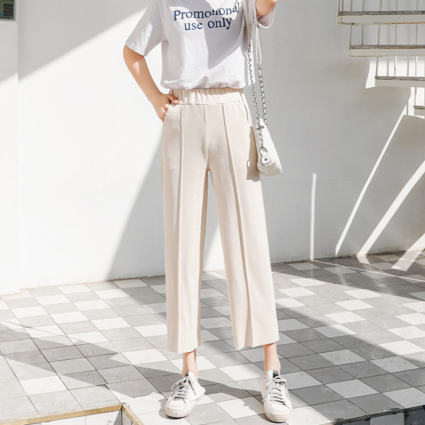 Modern női nadrág fehér és fekete színben