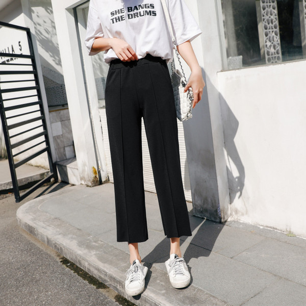 Modern női nadrág fehér és fekete színben