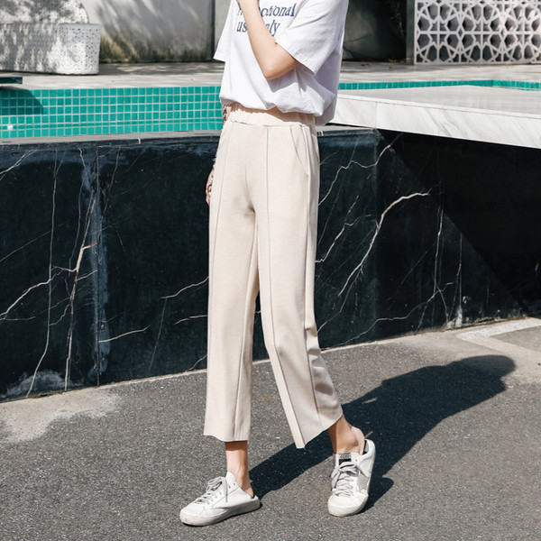 Modern női nadrág fehér és fekete színben