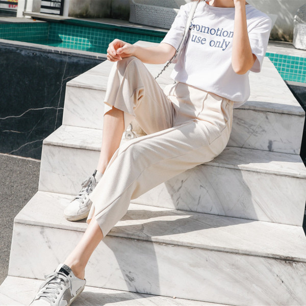 Modern női nadrág fehér és fekete színben