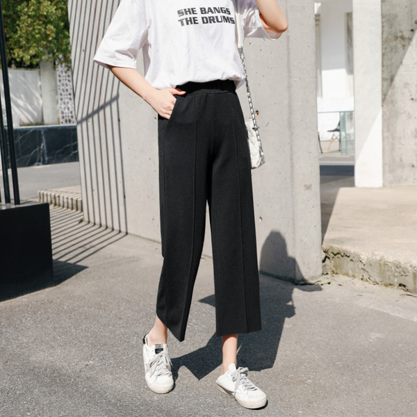 Modern női nadrág fehér és fekete színben