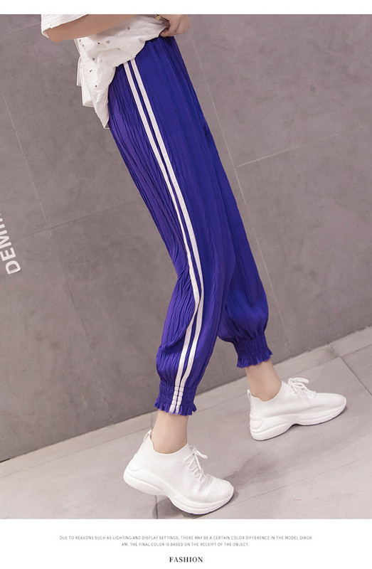 Pantaloni sport de dama cu elastic si cu margini