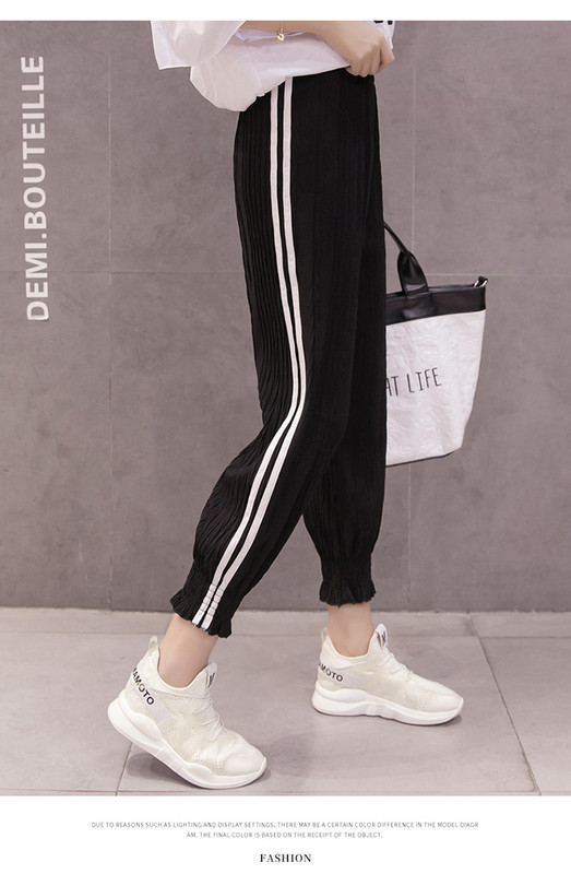 Pantaloni sport de dama cu elastic si cu margini