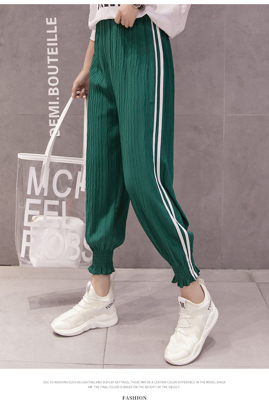 Pantaloni sport de dama cu elastic si cu margini