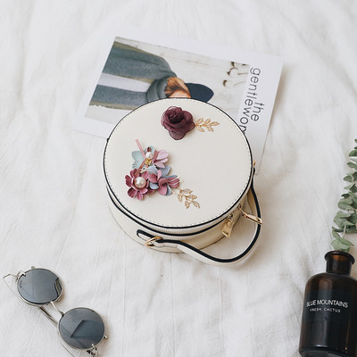 Modern női táska kerek formával és 3D-s virágokkal