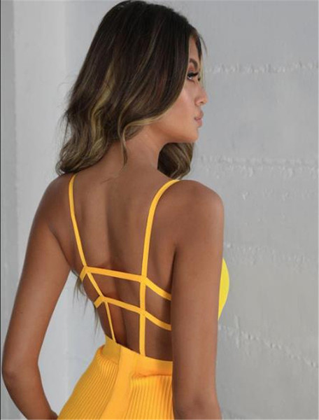 Alkalmi női ruha sárga és fekete színben, vékony pántokkal