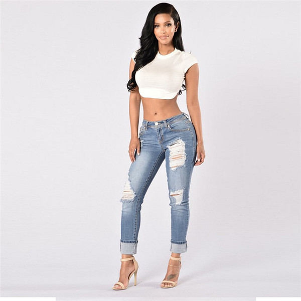 Стилни дамски дънки с разкъсани мотиви до 2XL