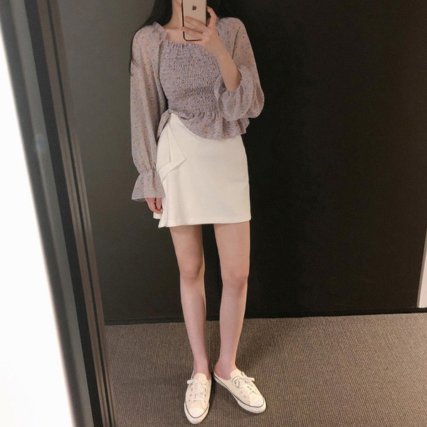 Модерна дамска пола в бял цвят с висока талия