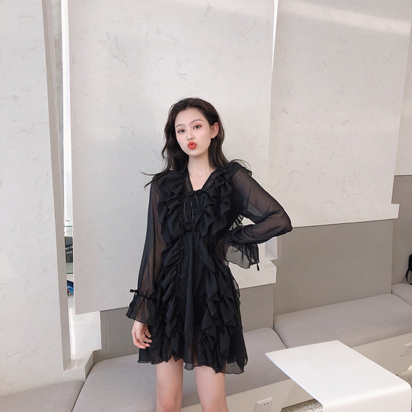 Стилна дамска рокля в два цвята с прозрачни ръкави