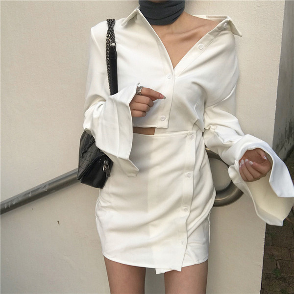 Небрежна дамска рокля в черен и бял цвят с копчета