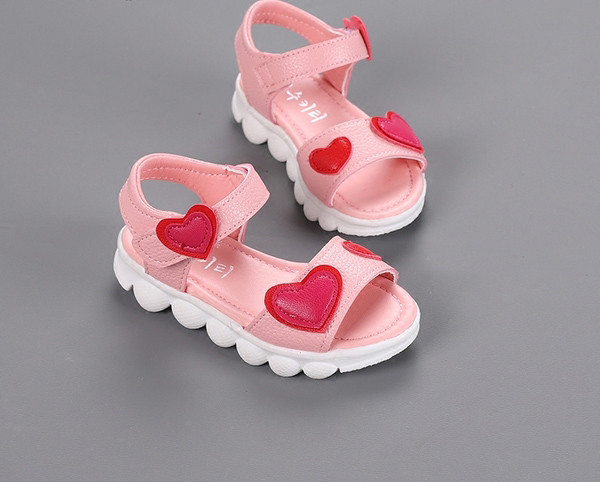Sandale elegante pentru copii în alb și roz