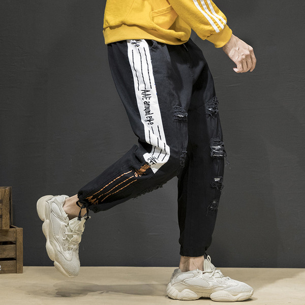 Pantaloni moderni pentru bărbați cu margini și motto-uri rupte