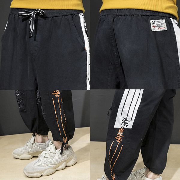 Pantaloni moderni pentru bărbați cu margini și motto-uri rupte