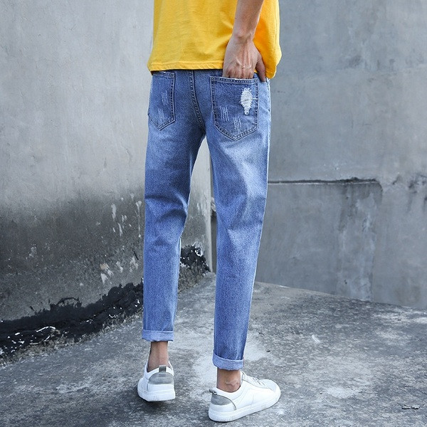 Blugi de bărbați moderni de culoare albastră cu motive rupte