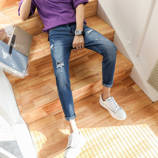 Blugi moderni pentru bărbați cu motive rupte și emblemă