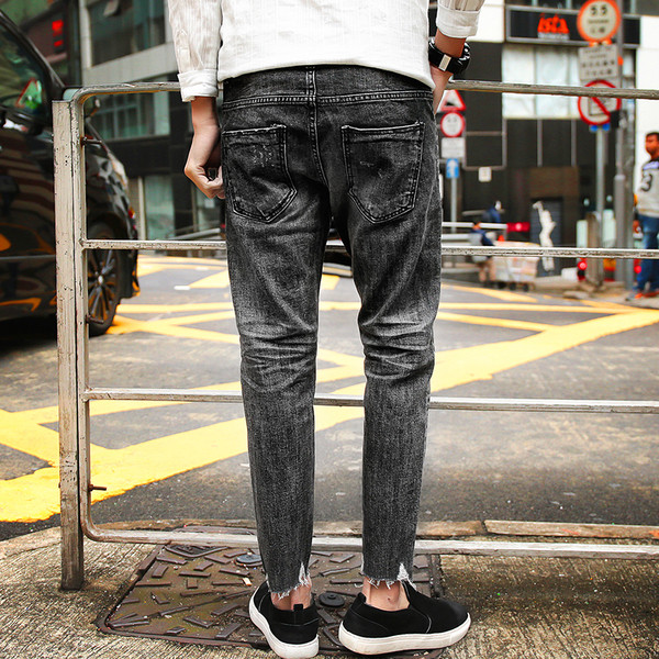 Blugi de bărbați stilați, cu buzunare și motive rupte