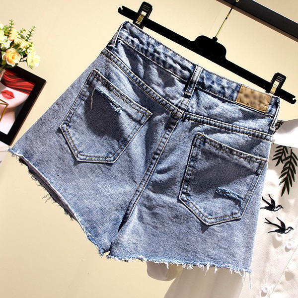 Blugi de dama eleganti cu talie inalta si motiv rupt