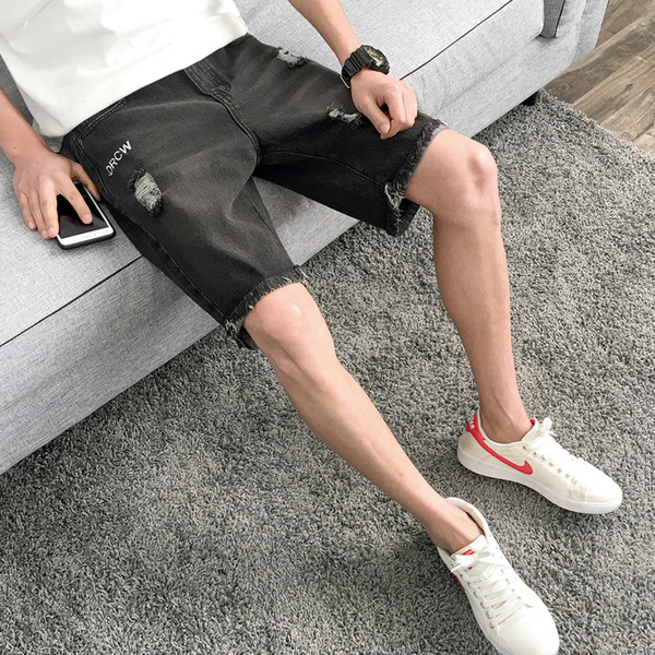 Blugi de bărbați scurti în două culori cu motive rupte