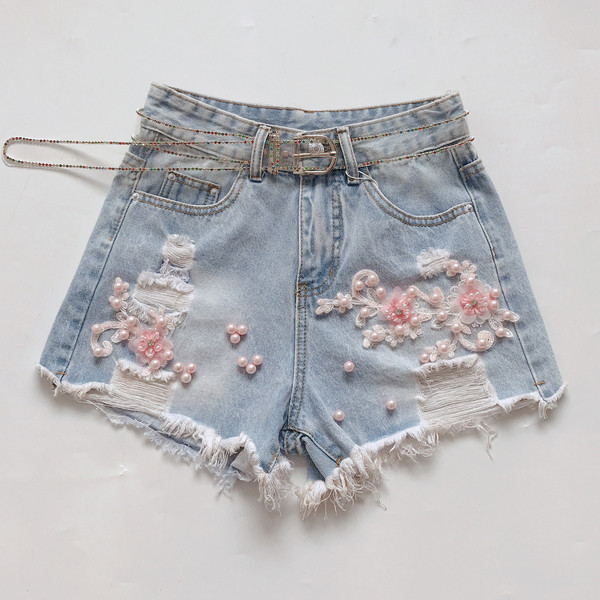 Blugi de dama moderni cu perle si motive rupte