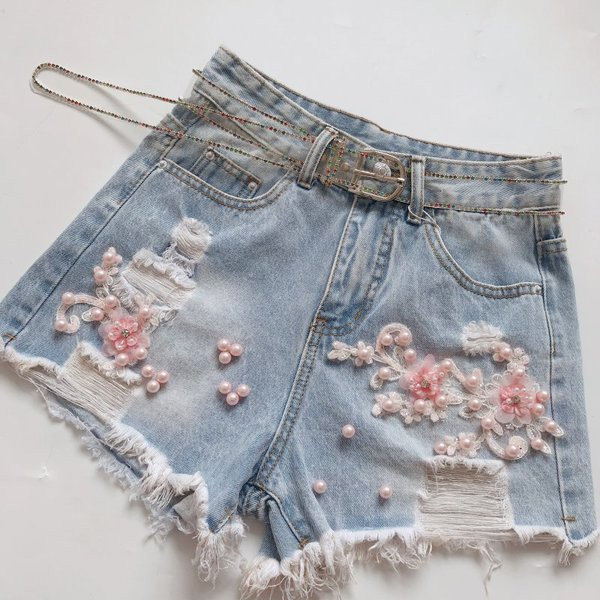 Blugi de dama moderni cu perle si motive rupte