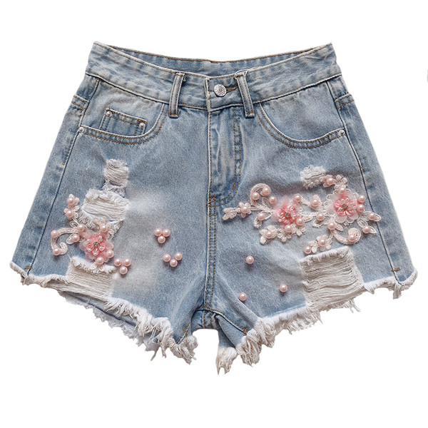 Blugi de dama moderni cu perle si motive rupte