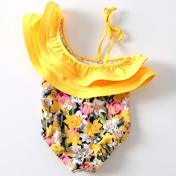 Modern gyerek fürdőruha virágos motívumokkal