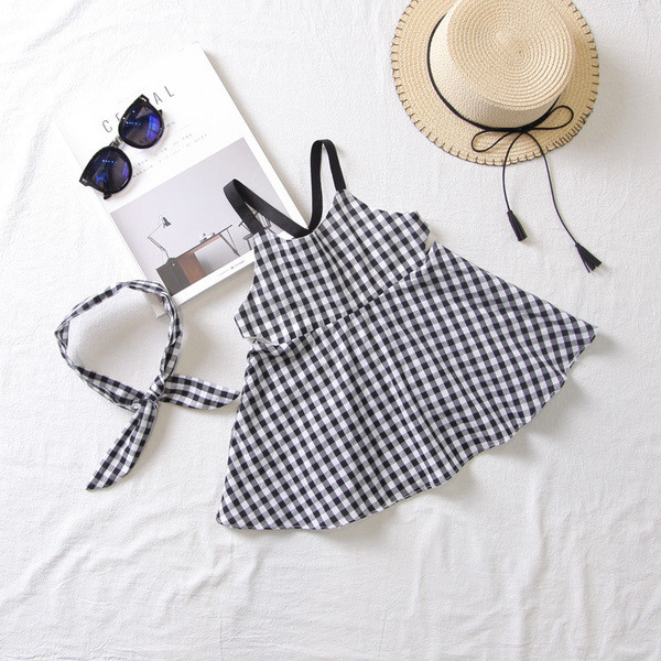 HIT Modern kockás gyerekruha modell fekete-fehér színben