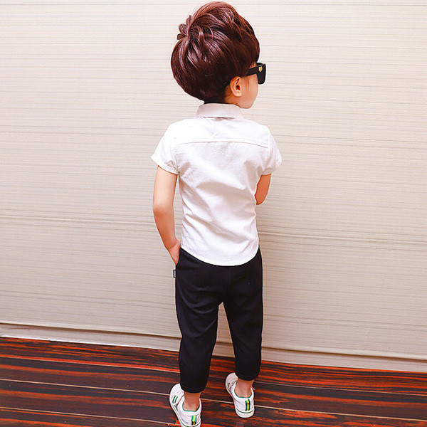 Fehér színű, rövid ujjú gyereking fiúknak