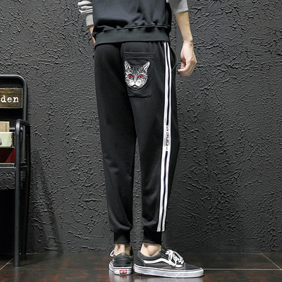 Lezser férfi sportnadrág két színben hímzéssel