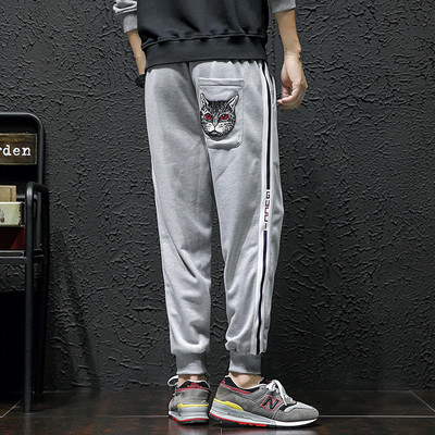 Lezser férfi sportnadrág két színben hímzéssel