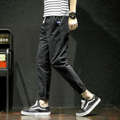 Férfi sport- és alkalmi nadrág két színben nyakkendővel