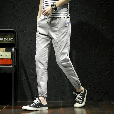 Férfi sport- és alkalmi nadrág két színben nyakkendővel