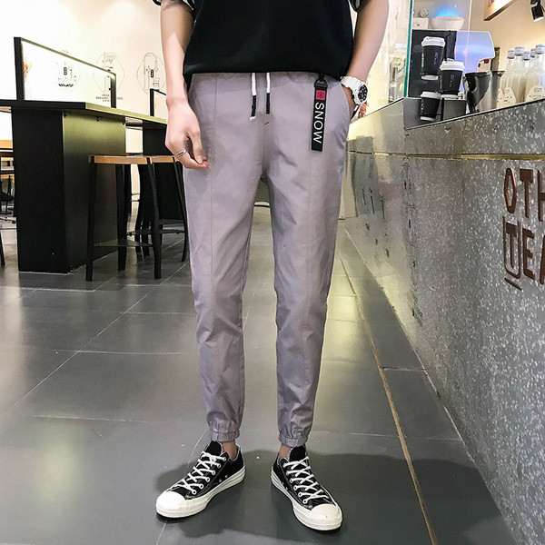 Férfi sport- és alkalmi nadrág két színben felirattal és nyakkendővel