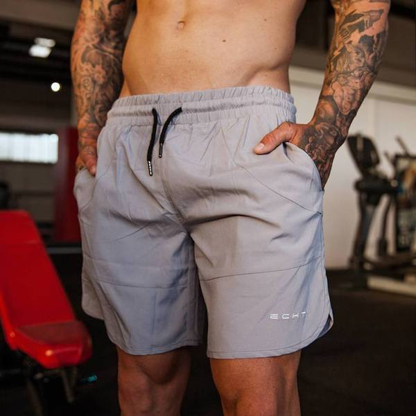 Sport és alkalmi férfi nadrág három színben nyakkendőben felirattal