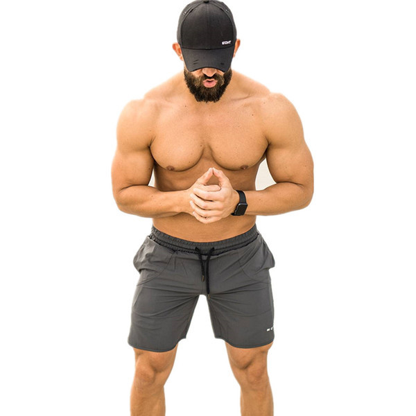 Sport és alkalmi férfi nadrág három színben nyakkendőben felirattal