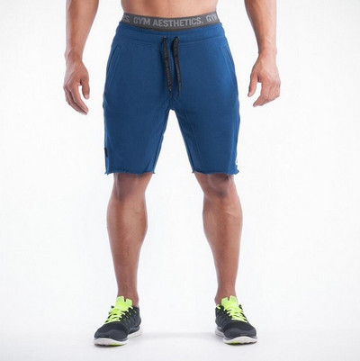 Pantaloni scurți la modă pentru bărbați în mai multe culori cu buzunare