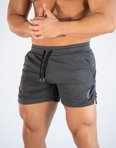Sports shorts for men in several colors with an inscription
