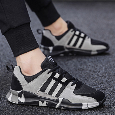 Modern férfi tornacipő fekete-fehér fűzővel