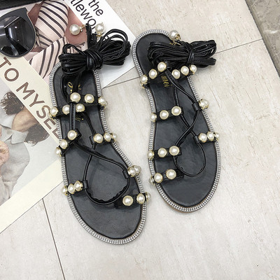 Stílusos női szandál gyöngyökkel és nyakkendőkkel fekete és bézs színben