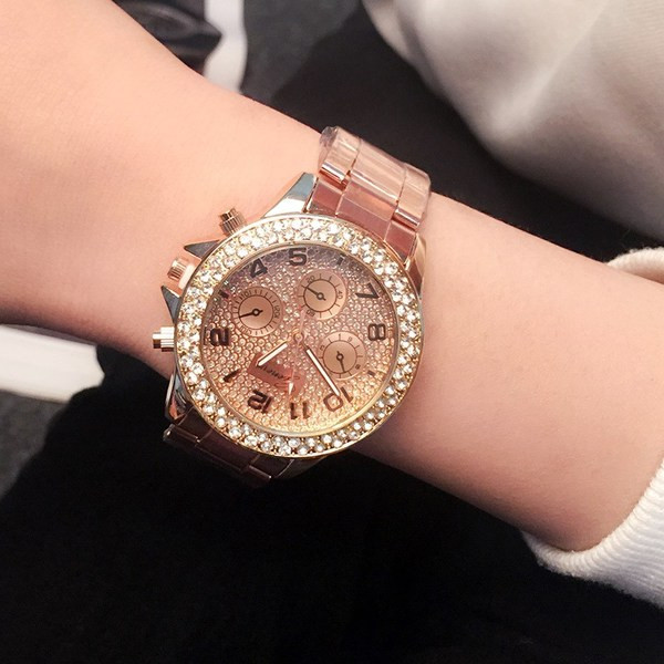 Stílusos női karóra fém lánccal és kövekkel