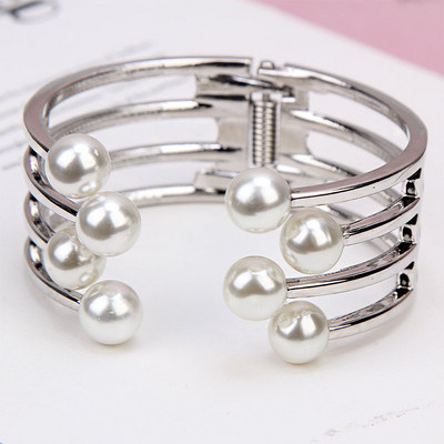 Γυναικείο βραχιόλι με πέρλες σε χρυσό και ασημί χρώμα